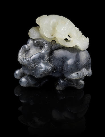 Appraisal: A black and white jade carving of a water buffalo