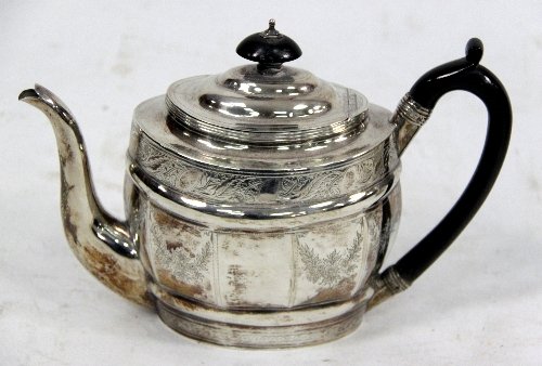 Appraisal: A silver teapot Samuel Hannell London of oval form engraved