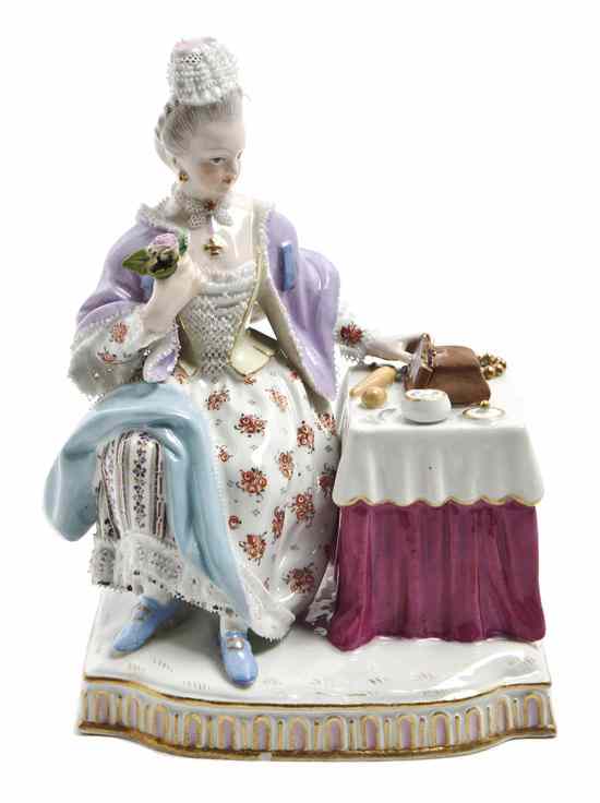 Appraisal: A Meissen Porcelain Lace Figure depicting a lady seated at