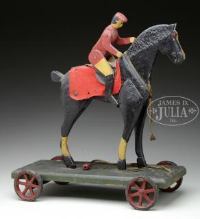 Appraisal: CHILD'S HORSE AND RIDER CARVED AND PAINTED PULL TOY Late