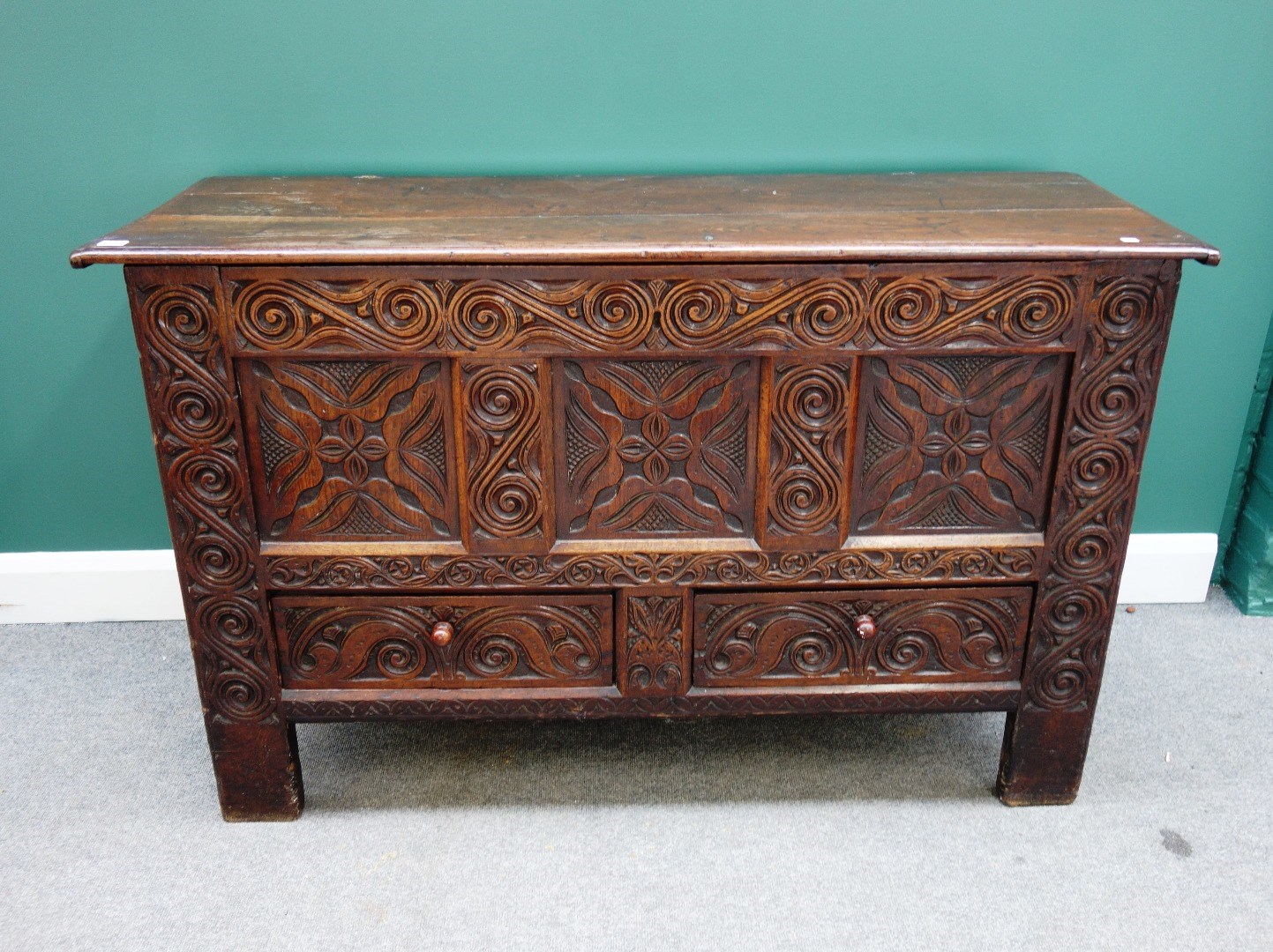 Appraisal: An th century later carved oak mule chest the lift