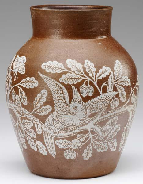 Appraisal: CHARLES GRAHAM Salt-glazed stoneware vase acid-etched with parrots and butterfly