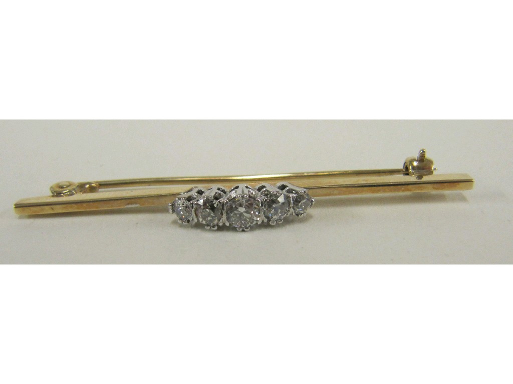 Appraisal: Nine carat bar brooch with a central row of graduating