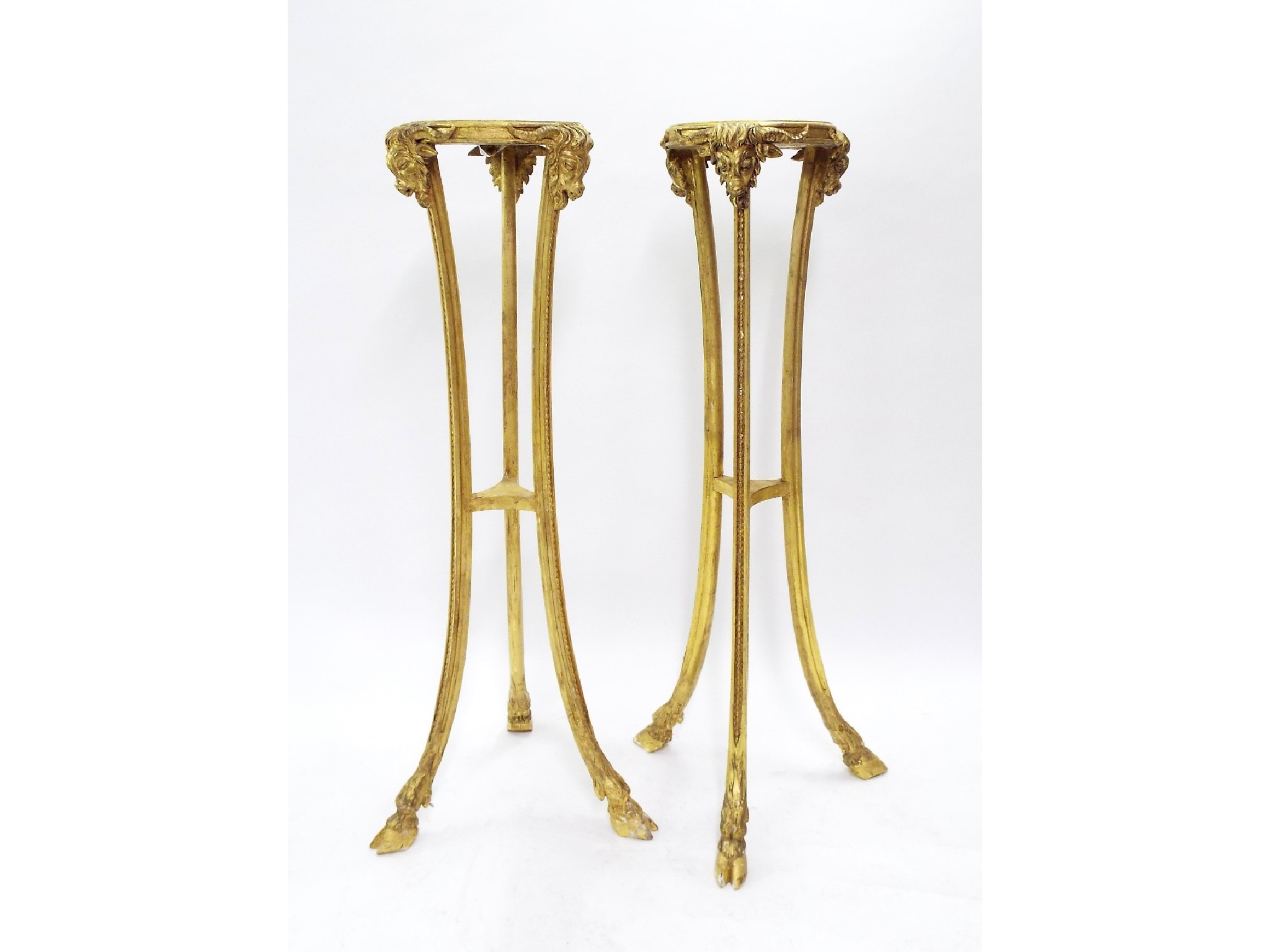 Appraisal: Quality pair of carved giltwood torcheres the with painted green