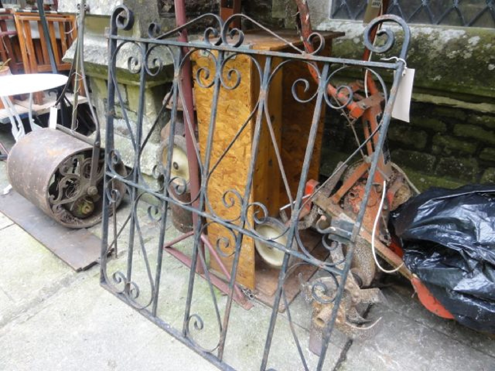 Appraisal: Four rectangular iron work sections of railing with simple scrollwork