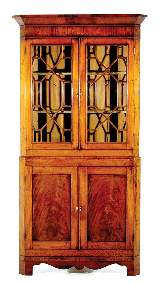 Appraisal: Georgian style mahogany corner cupboard circa molded cornice with canted