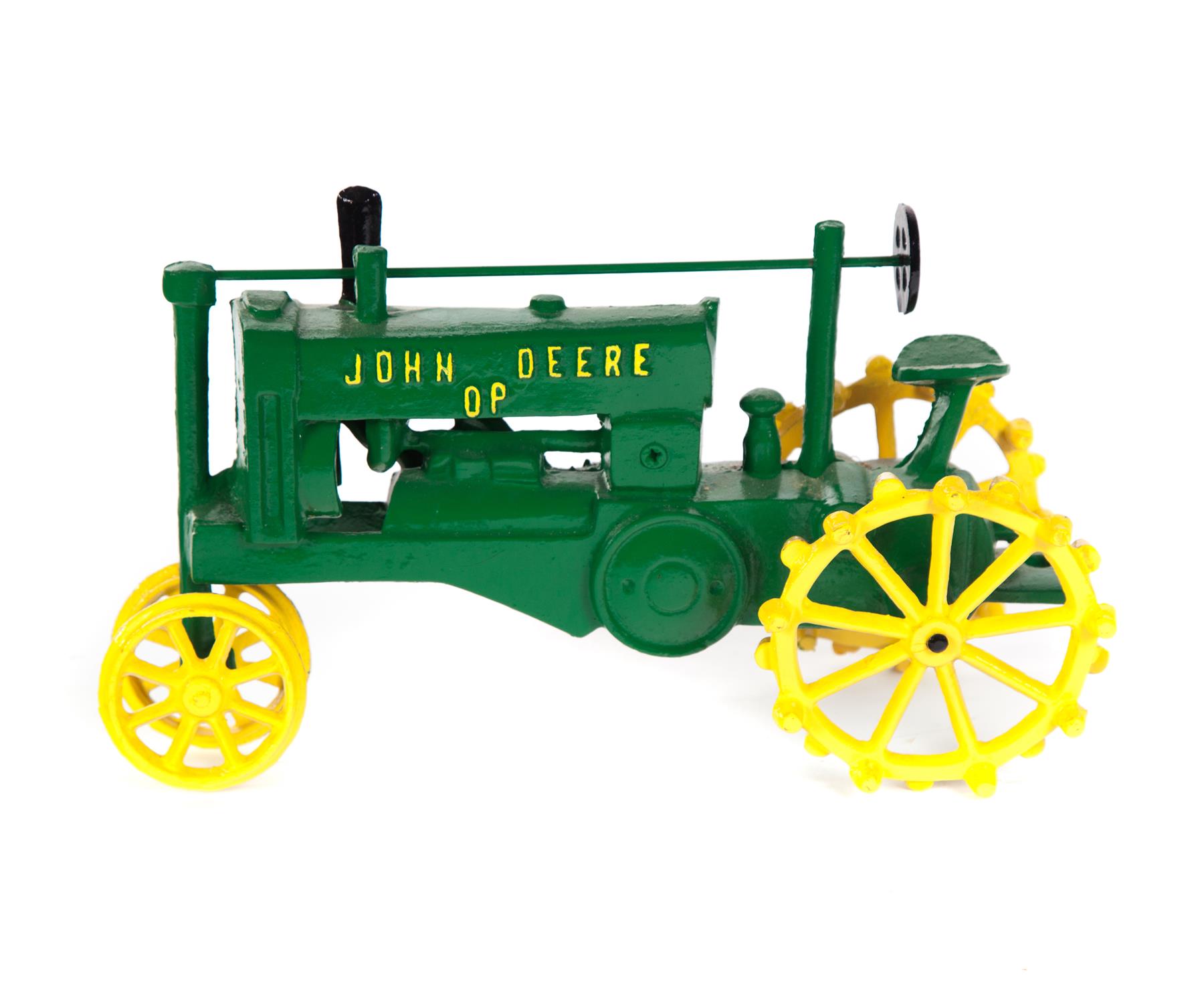 Appraisal: CAST IRON JOHN DEERE TOY TRACTOR Late th century Fixed