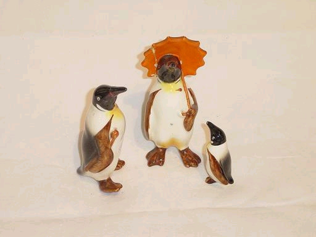 Appraisal: A family of Beswick penguins including a father a mother