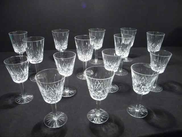 Appraisal: Fifteen Waterford Irish cut crystal wine stems in the ''Lismore''