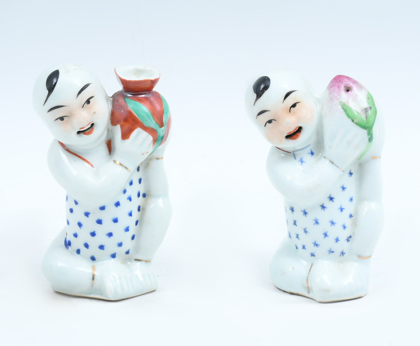 Appraisal: PAIR CHINESE HO-HO BOYS WATER DROPPERS - Chinese polychromed porcelain