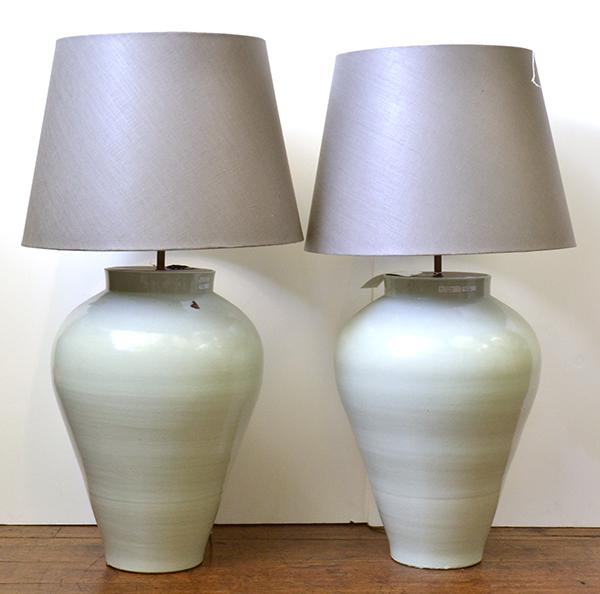 Appraisal: A SUBSTANTIAL PAIR OF BLANC DE CHINE GLAZED EARTHENWARE LAMP