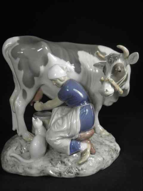 Appraisal: Bing and Grondahl porcelain figural group featuring a milkmaid milking