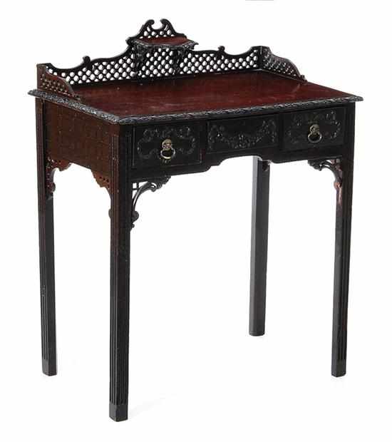 Appraisal: George III carved mahogany dressing table th century fretwork pediment