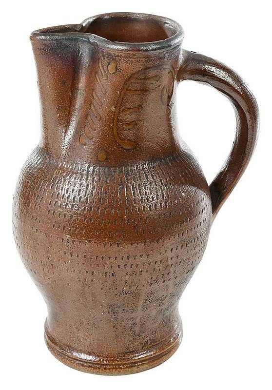 Appraisal: Slip Decorated Stoneware Jug American or Continental th century slip