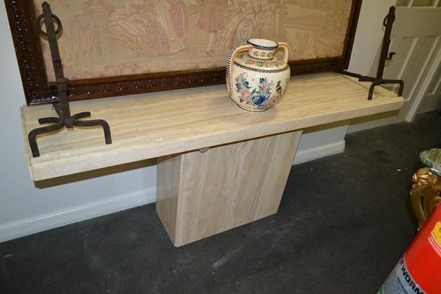 Appraisal: A TRAVERTINE CONSOLE TABLE A TRAVERTINE CONSOLE TABLE