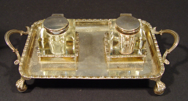 Appraisal: Rectangular silver desk stand fitted with two cut glass inkwells