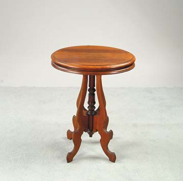 Appraisal: VICTORIAN WALNUT OVAL PLANT STAND Center turned column supported by