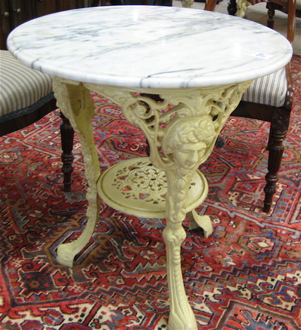 Appraisal: MARBLE-TOPPED CAST IRON PUB TABLE English th century having a