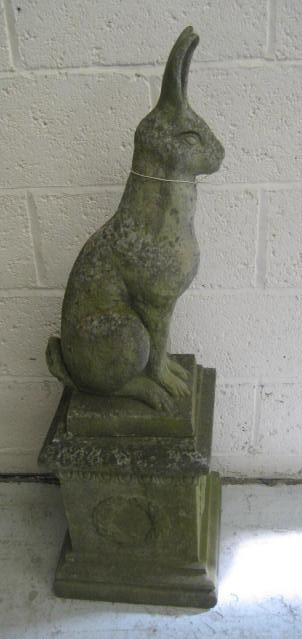 Appraisal: A COMPOSITION STONE FIGURE OF A HARE present manufacture modelled