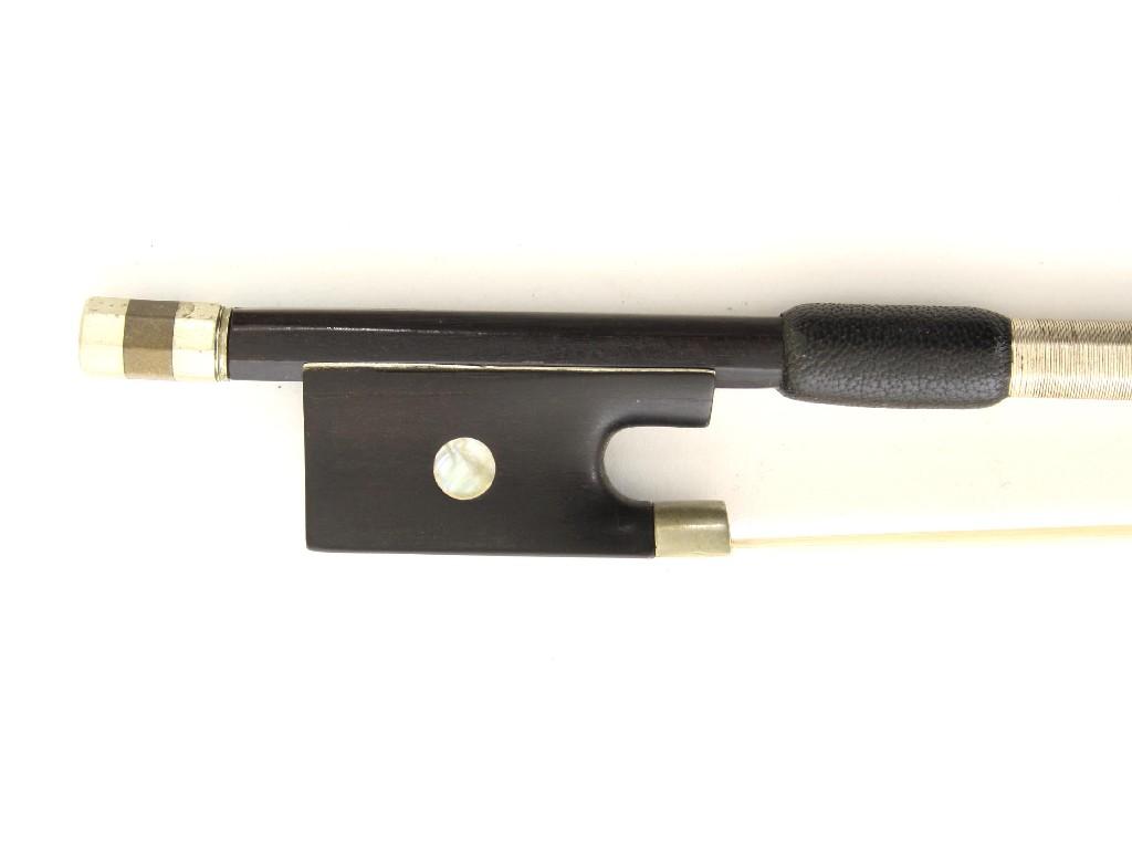 Appraisal: French nickel mounted violin bow indistinctly stamped gm