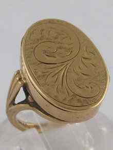 Appraisal: A carat gold ''poison'' ring with oval engraved top