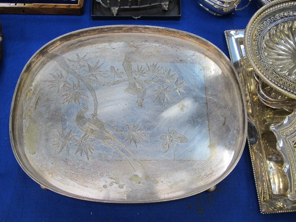 Appraisal: A heavy silver plated serving tray decorated with birds and