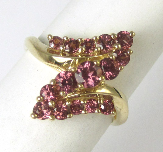 Appraisal: RHODOLITE GARNET AND TEN KARAT GOLD RING set with a