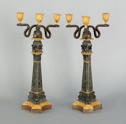 Appraisal: Pair of French bronze and ormolu three arm candelabra late