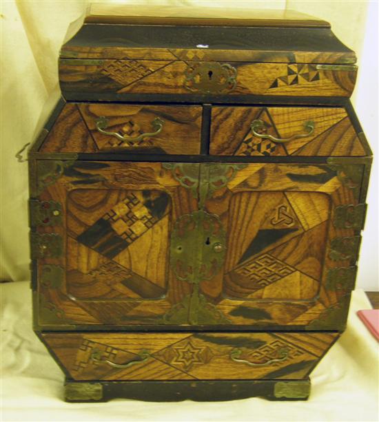 Appraisal: A JAPANESE INLAID WOOD TABLE CABINET with drawers and doors