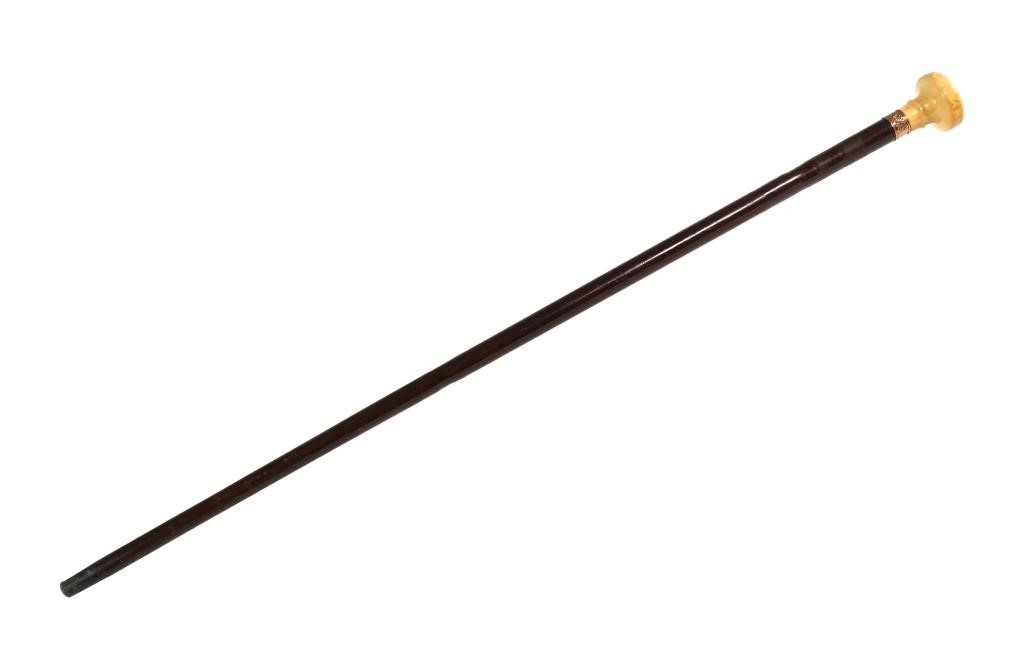 Appraisal: Dark wood walking stick cane wood tip with large wide