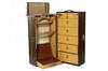 Appraisal: LOUIS VUITTON WARDROBE - Vintage upright mounted Louis Vuitton wardrobe