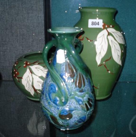 Appraisal: Brannam two green glazed vases decorated with stylised leaves and