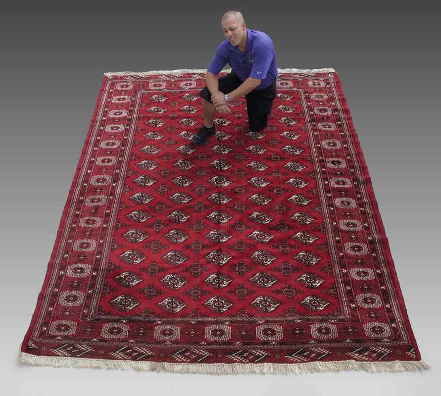 Appraisal: MODERN PAKISTANI BOKHARA HAND KNOTTED WOOL RUG ' '' x