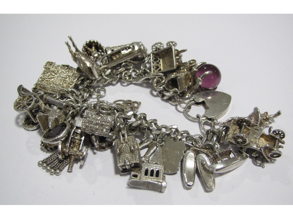 Appraisal: Silver charm bracelet