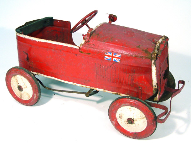 Appraisal: s child's metal pedal car with rubber tyred wheels painted