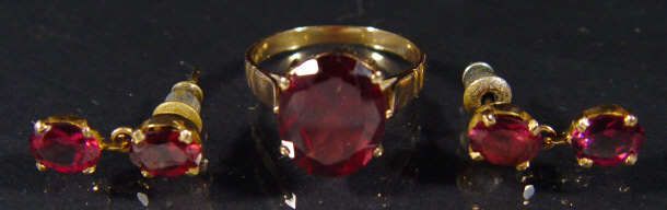 Appraisal: ct gold and garnet ring with matching earrings