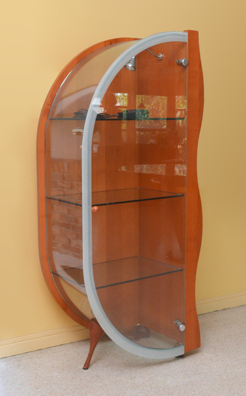 Appraisal: CONTEMPORARY DISPLAY CABINET Shaped case glass door and bowed glass