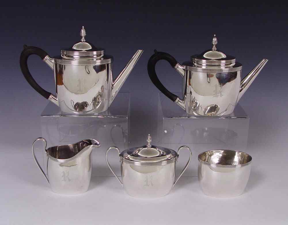 Appraisal: PIECE INTERNATIONAL PAUL REVERE TEA SET pieces hand hammered marked