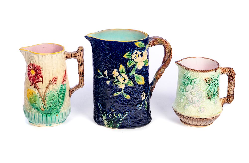 Appraisal: Antique Majolica Stoneware Pitchers Shows glaze crackling and pitchers have