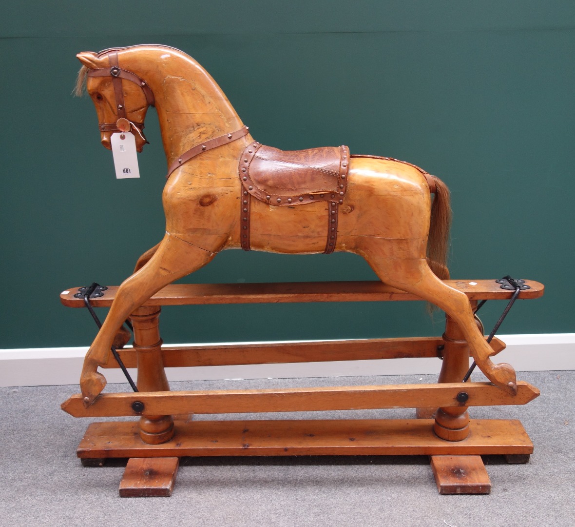 Appraisal: A pine rocking horse early th century paint traces but