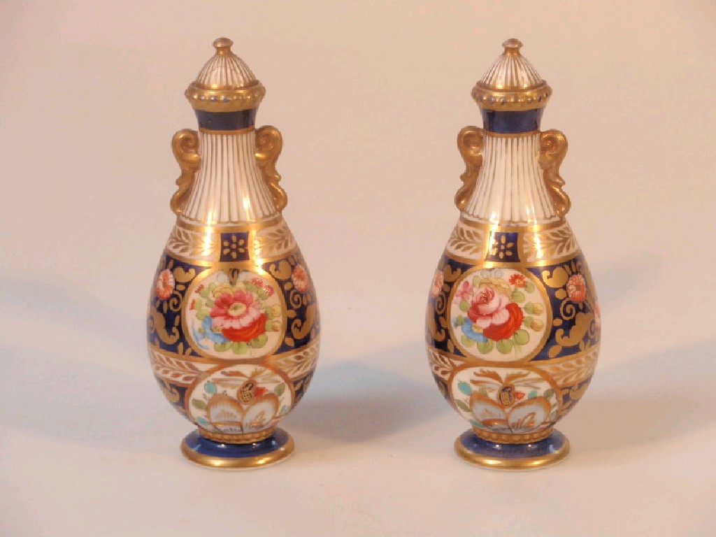 Appraisal: A pair of Crown Staffordshire porcelain ovoid vases and covers