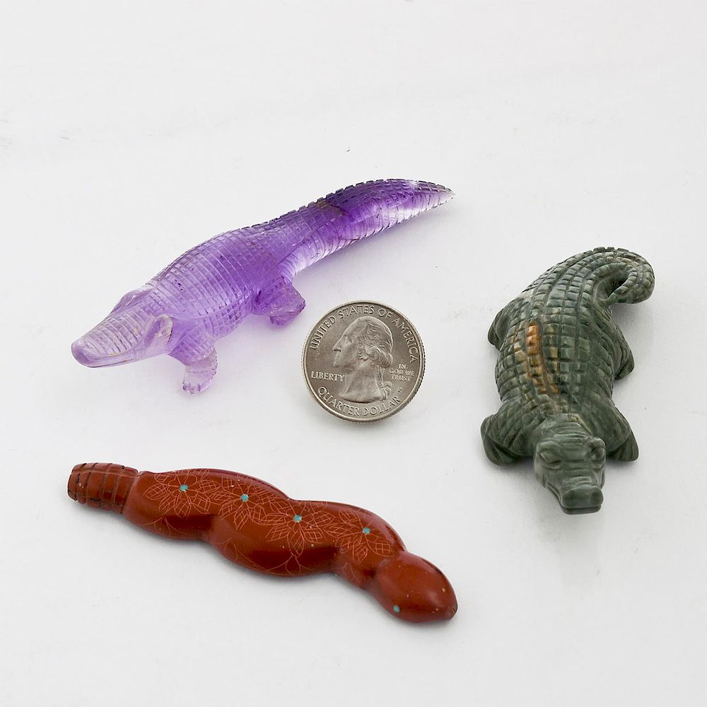 Appraisal: LOT OF CARVED REPTILE FIGURINES Carved glass alligator carved stone