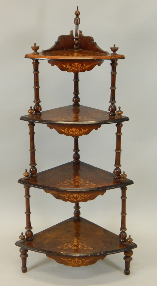 Appraisal: A late Victorian burr walnut and marquetry four tier corner