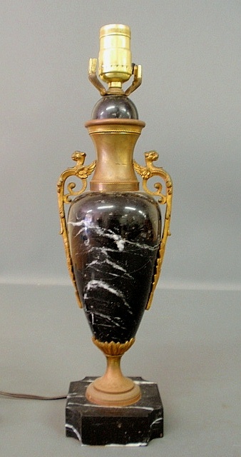 Appraisal: - Black marble urn-form table lamp with fire gilt ormolu