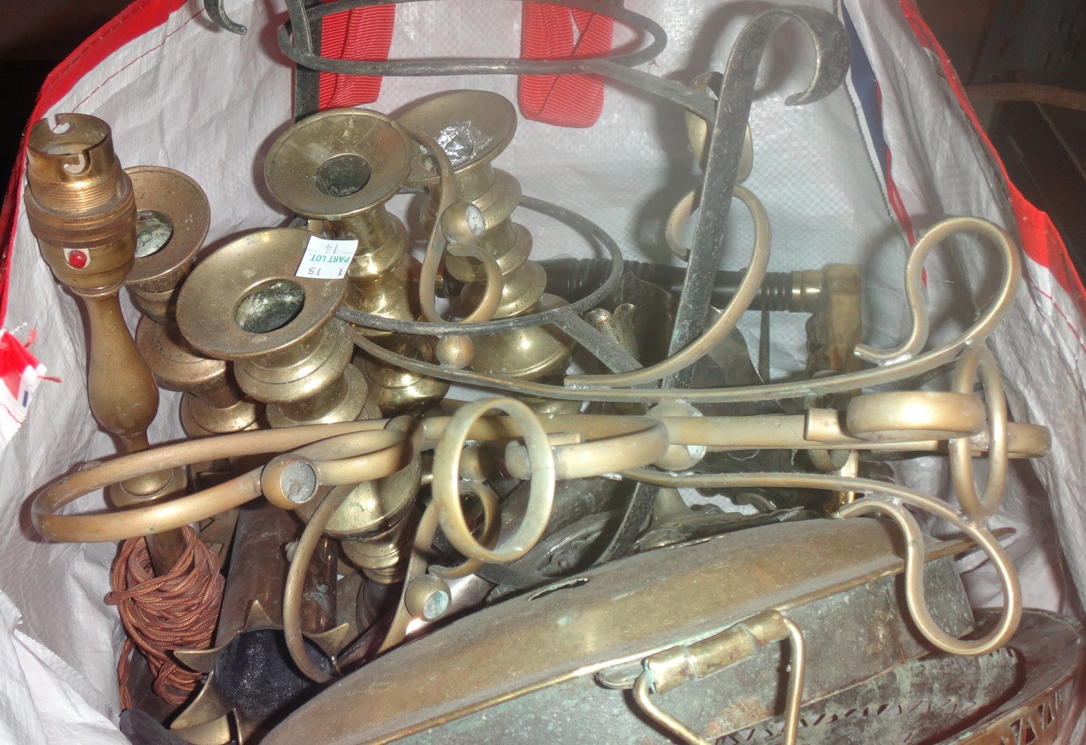 Appraisal: A quantity of assorted brassware candlesticks and sundry