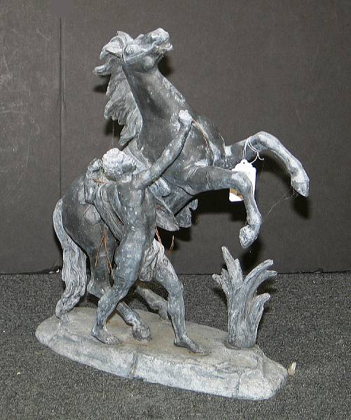 Appraisal: A pair of lead garden figures of the Marley horses