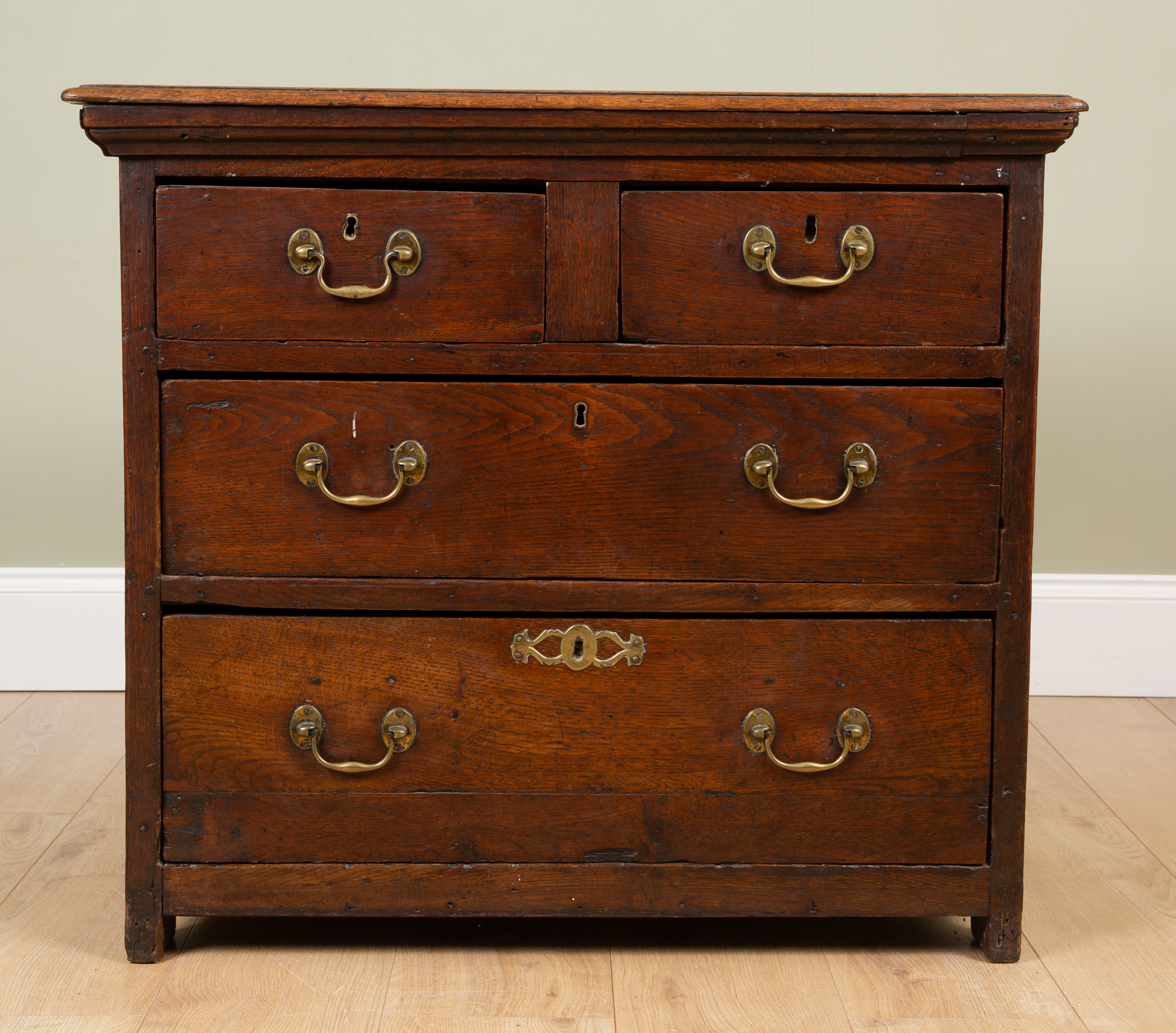 Appraisal: A small oak chest of two short and two long