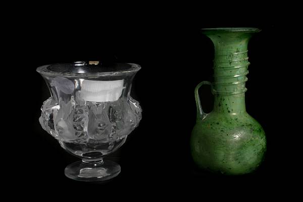 Appraisal: A Lalique molded glass footed vase and a green glass