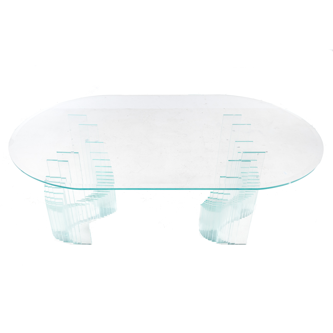 Appraisal: Contemporary glass dining table th century in W oval glass