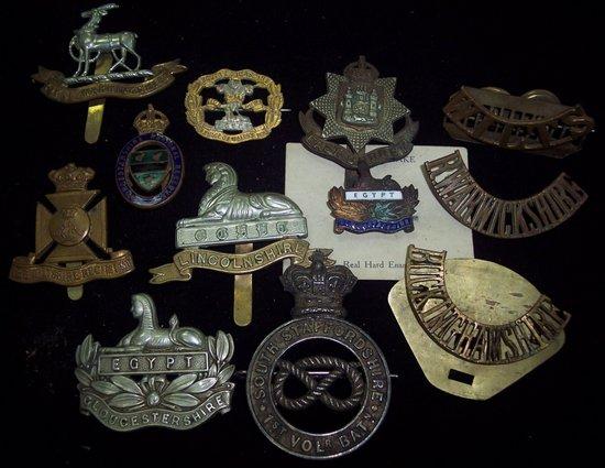 Appraisal: A quantity of military cap and other badges county regiments